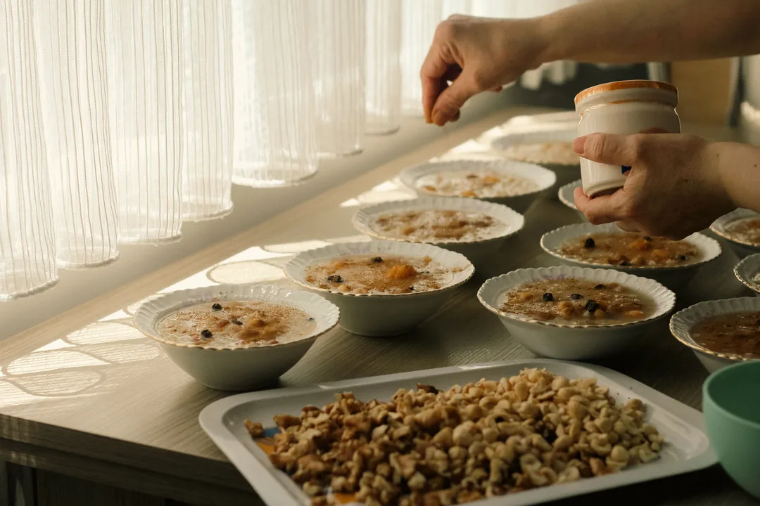 Oatmeal flakes and bowl for sensitive skin care