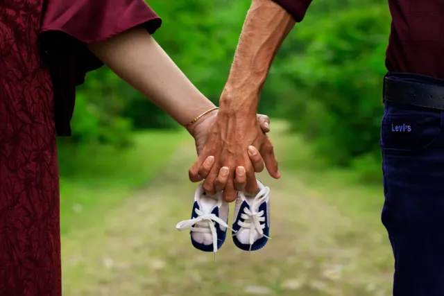 Couple holding hands